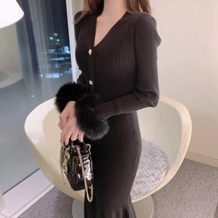 Knitted dress with faux fur sleeves